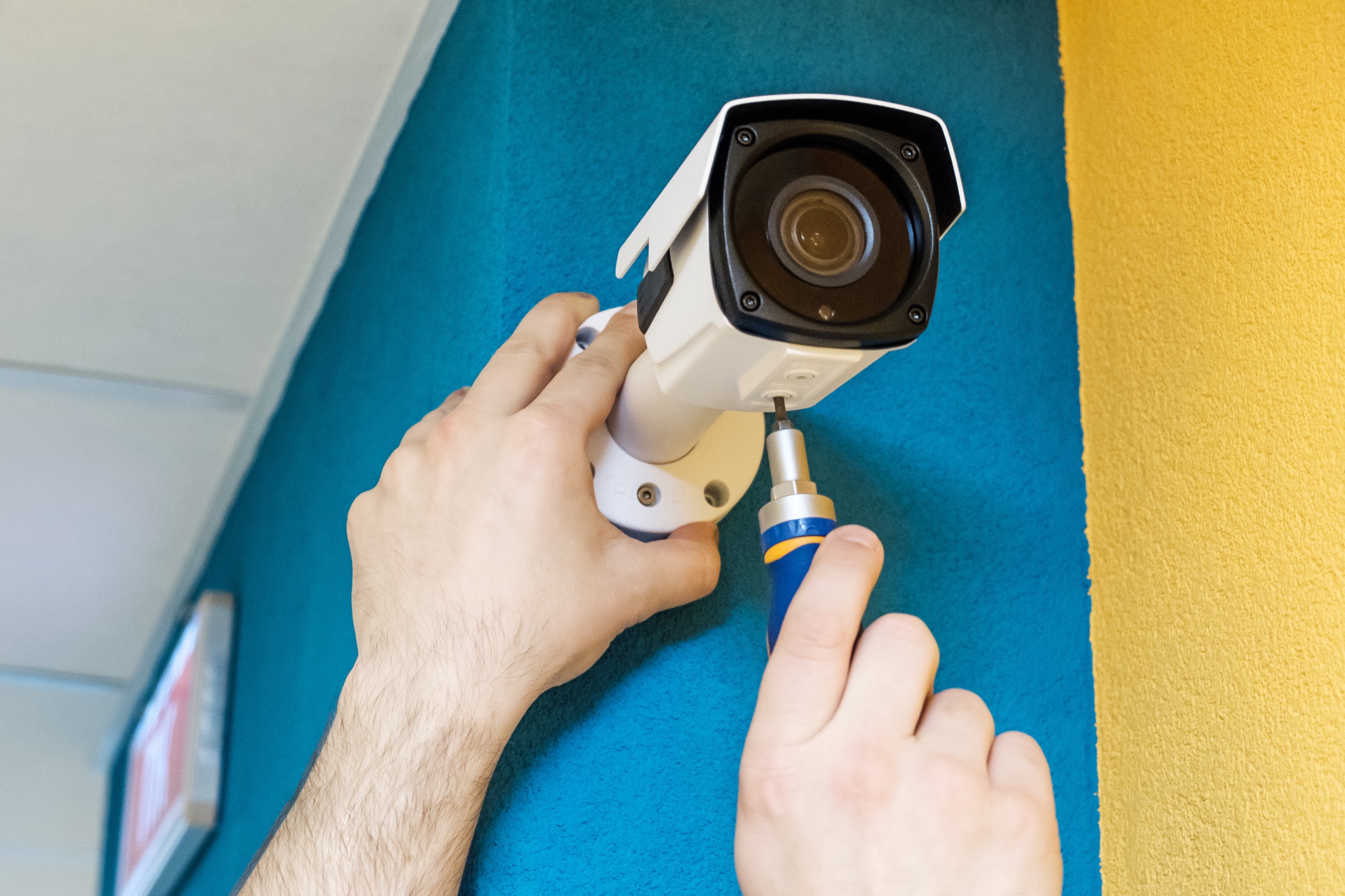 security camera being installed in melissa tx