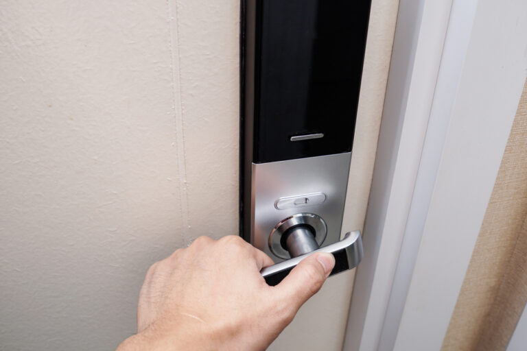 Hand Unlocking a Home Access Control System With Thumbprint